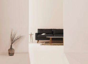 black and brown leather padded tub sofa